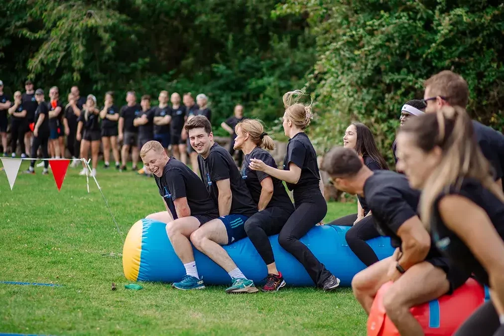 People participating in sport event during company summer fun day