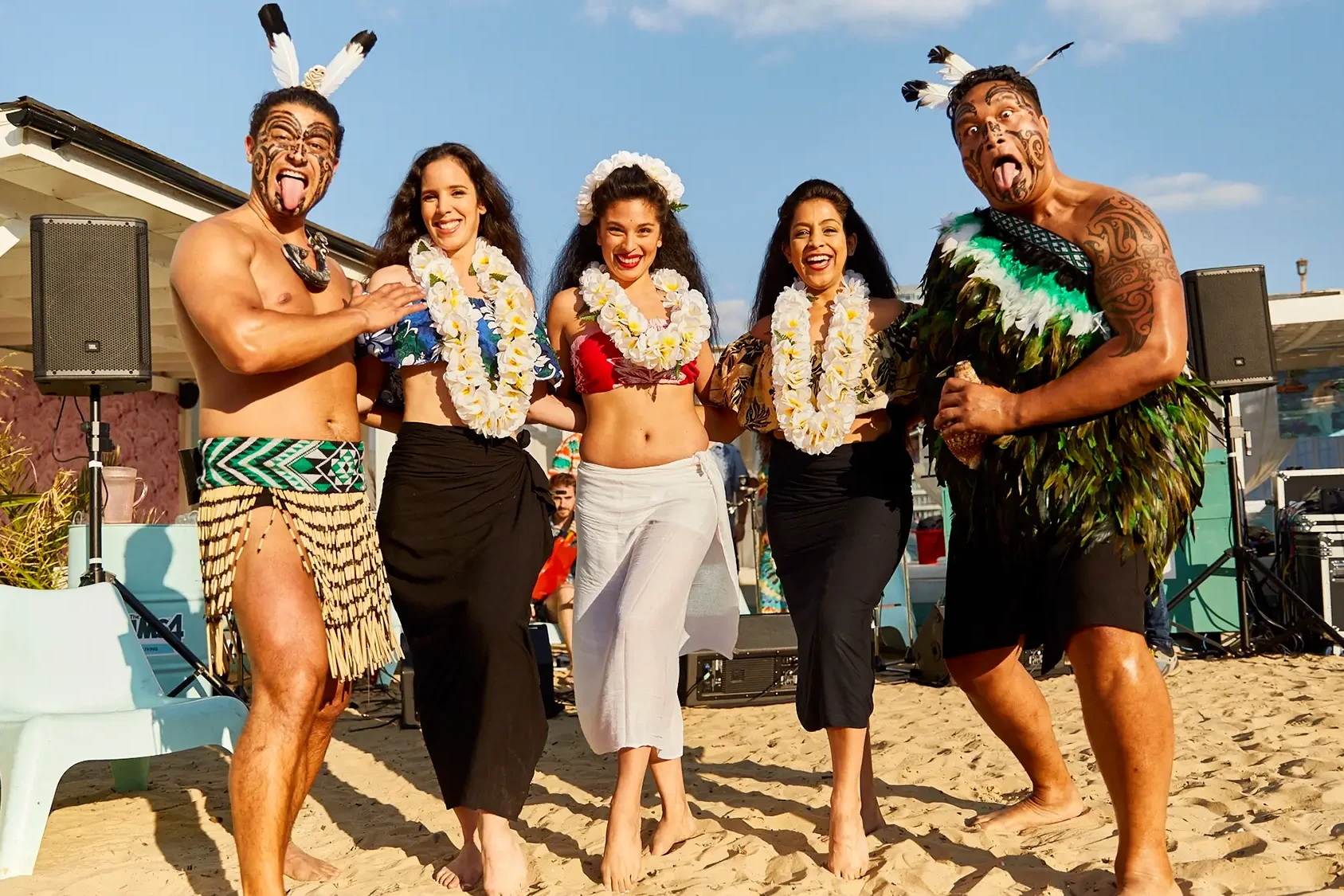 Haka team buulding performers on the beach