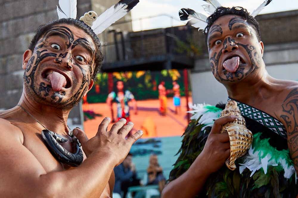 Two Maori men posing during a Haka