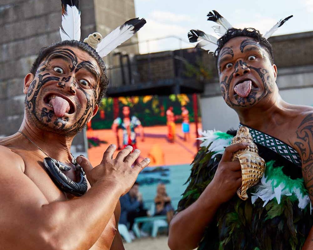 Two Maori men posing during a Haka