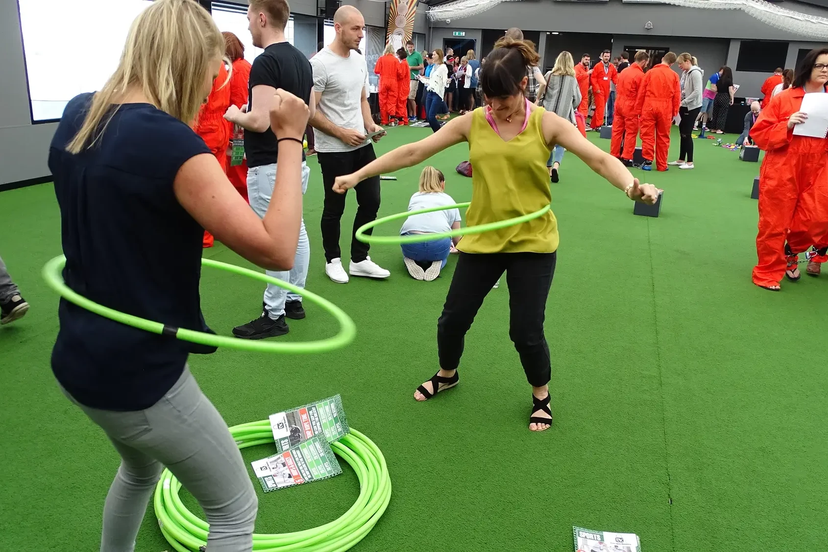 Team building activity in indoor venue with large group