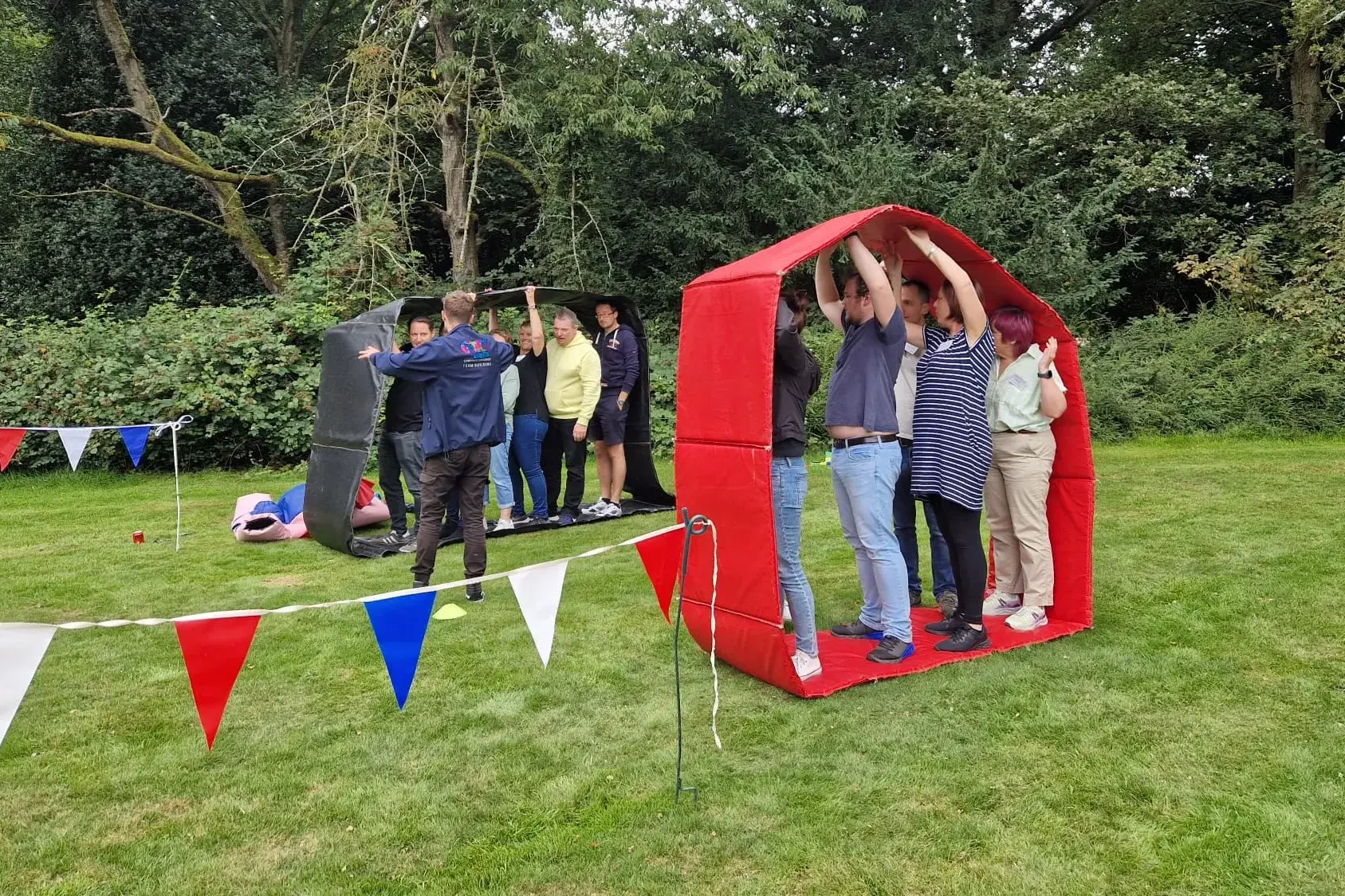 People participating in active challenge in Olympic sports day caterpillars