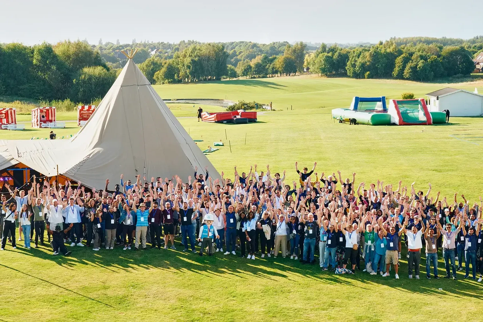 Large group of people at outdoor corporate event