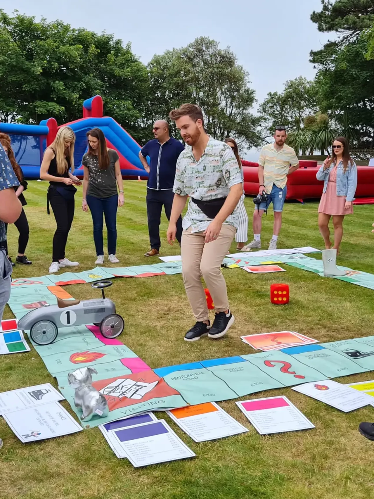 Teamopoly indoor team building activity giant monopoly on grass