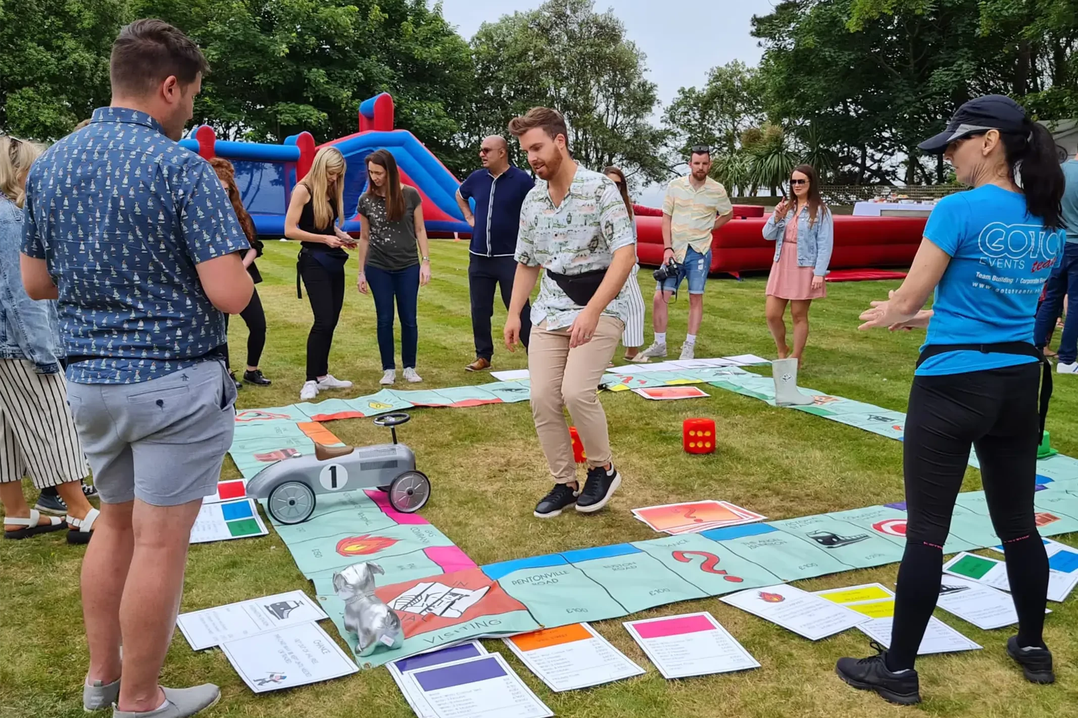 Teamopoly indoor team building activity giant monopoly on grass