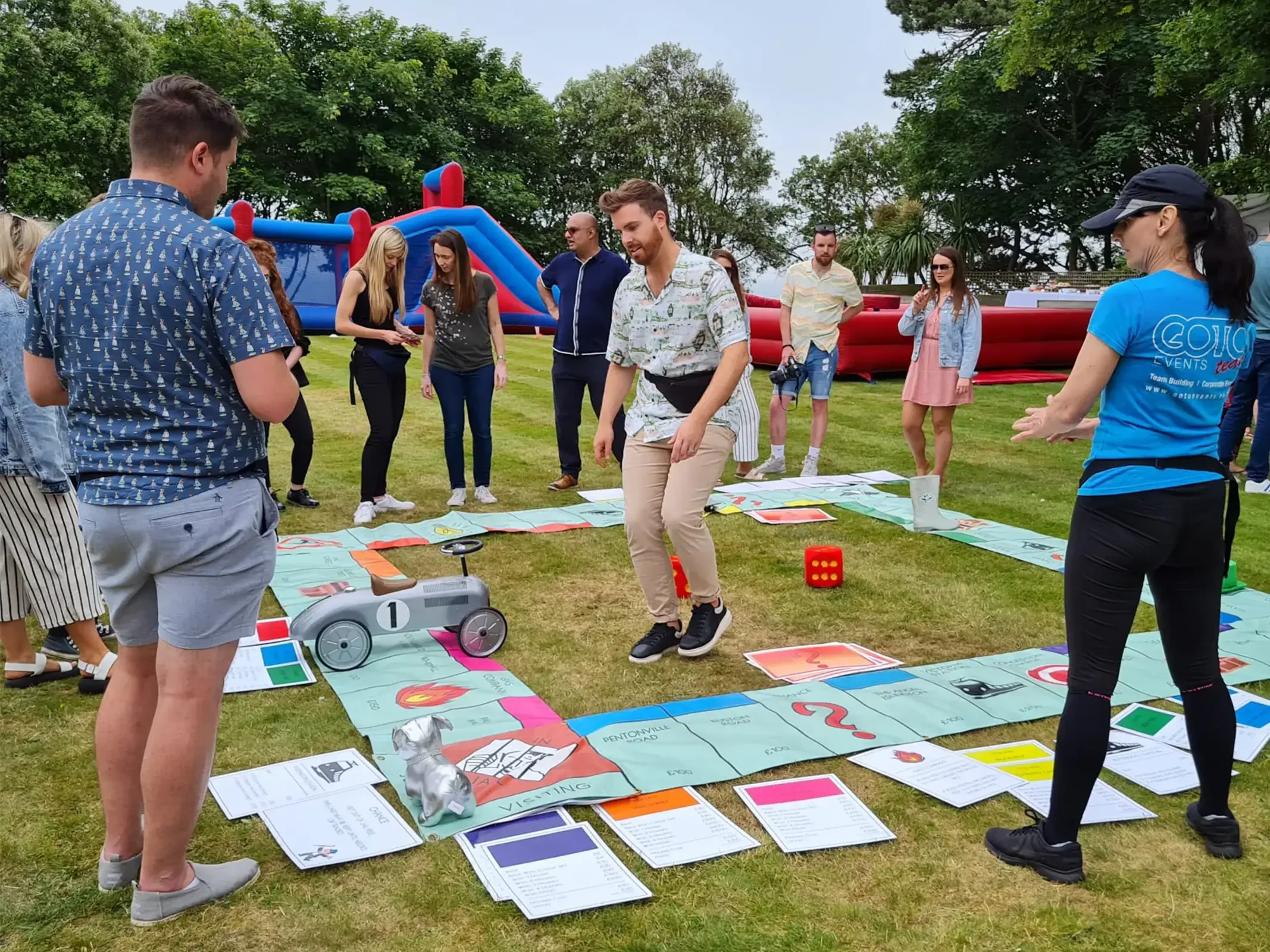 Teamopoly indoor team building activity giant monopoly on grass