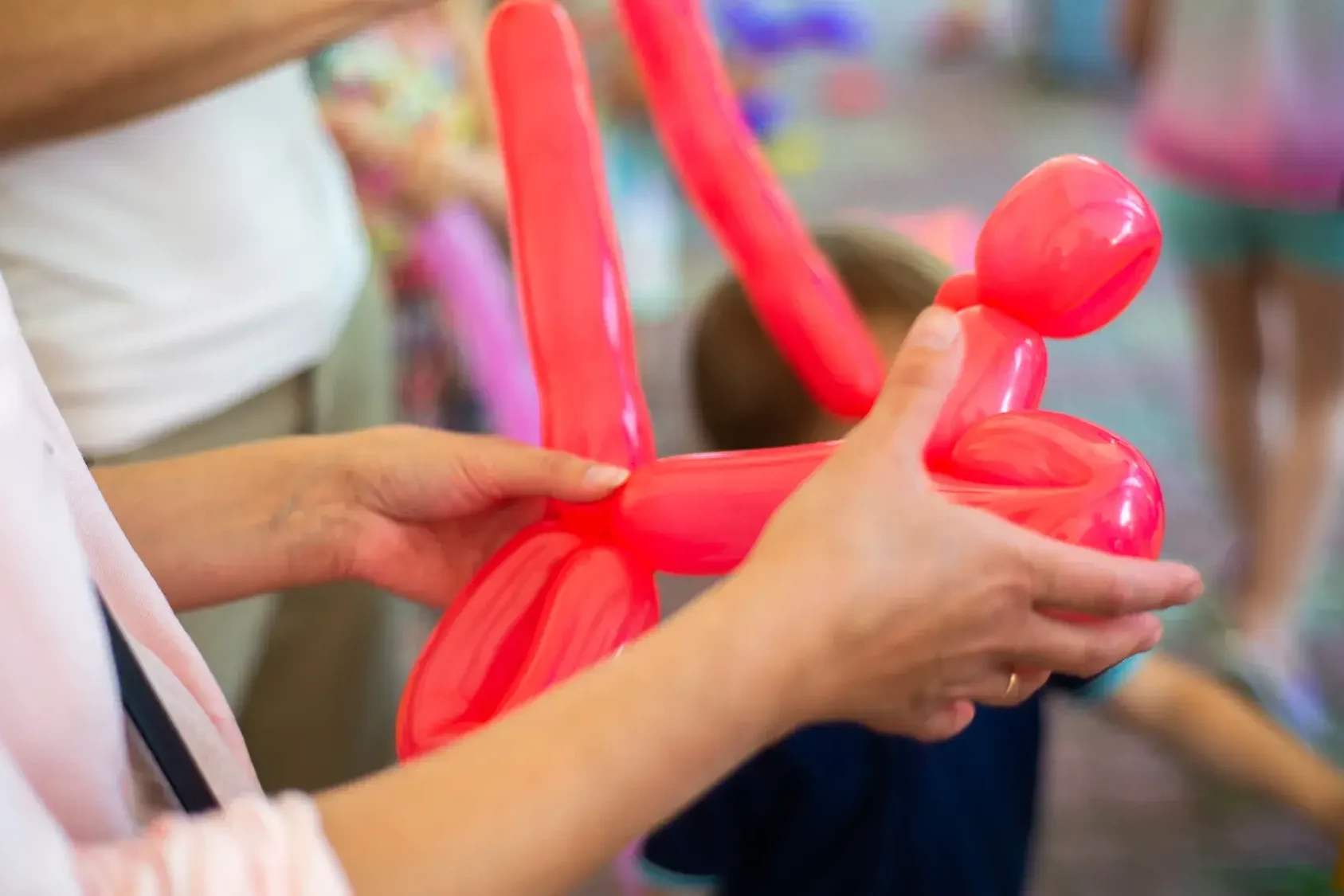 balloon modelling at circus skills corporate event