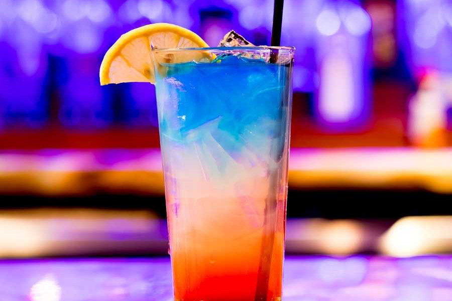 Brightly Coloured Cocktail on blurry background