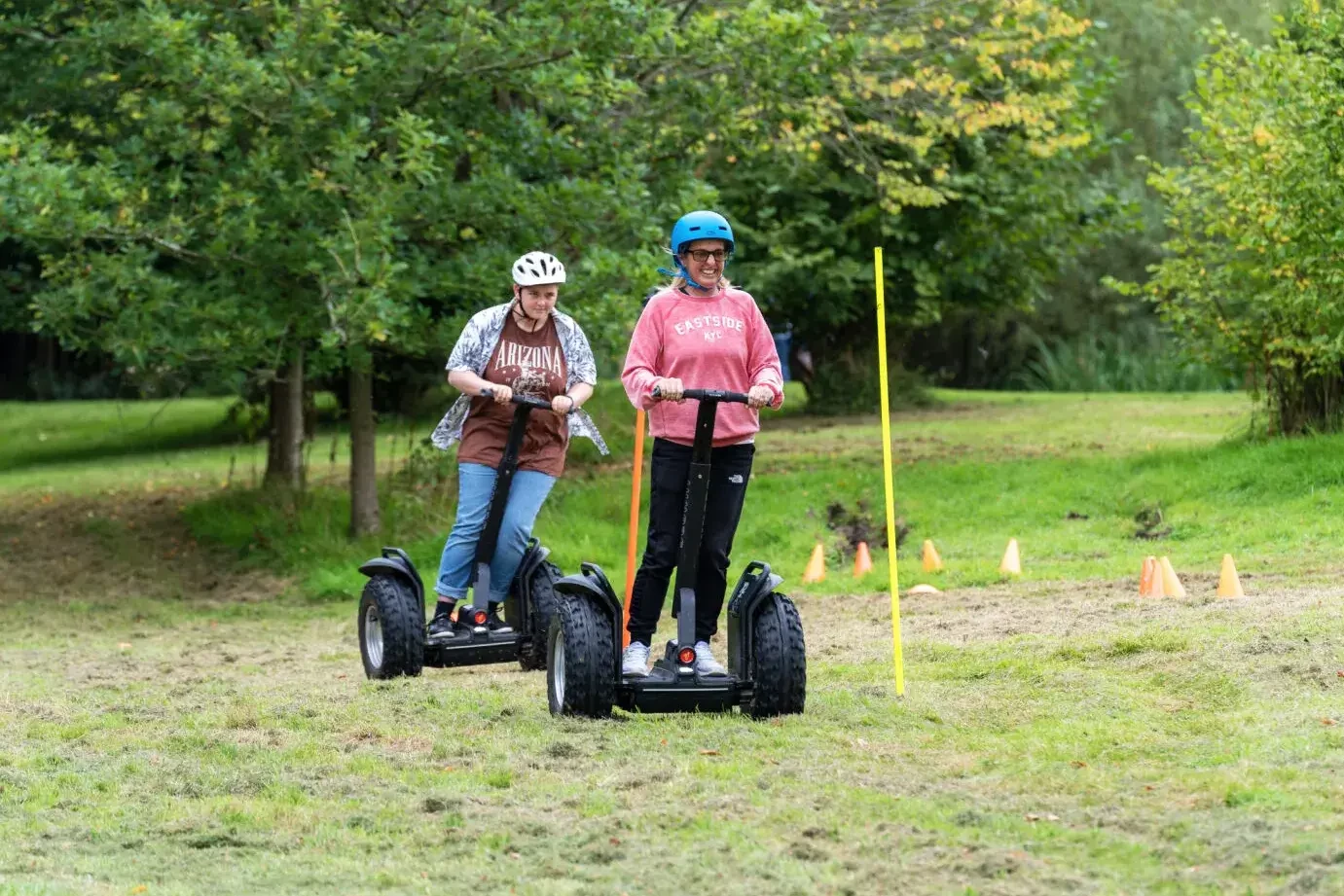 people on segway in outdoor team building event