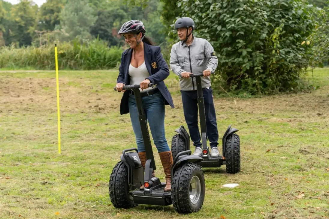 people on segway in outdoor company fun day